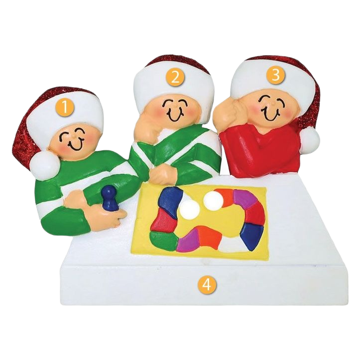 Personalized Christmas ornament with three smiling figures playing a colorful board game in holiday attire under $50 collection