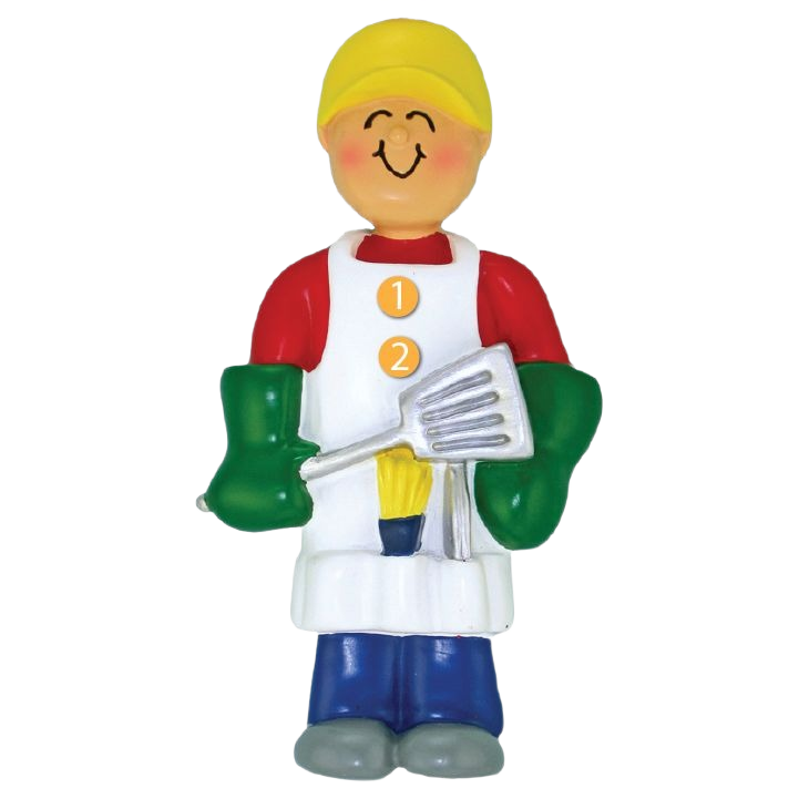 Smiling figure ornament wearing yellow hat, red shirt, white apron, green gloves, holding a spatula for grilling themed Christmas decoration