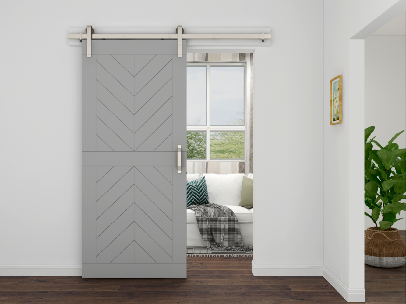 Satin nickel bar pull installed on a gray wood barn door in a modern interior under $50 hardware collection