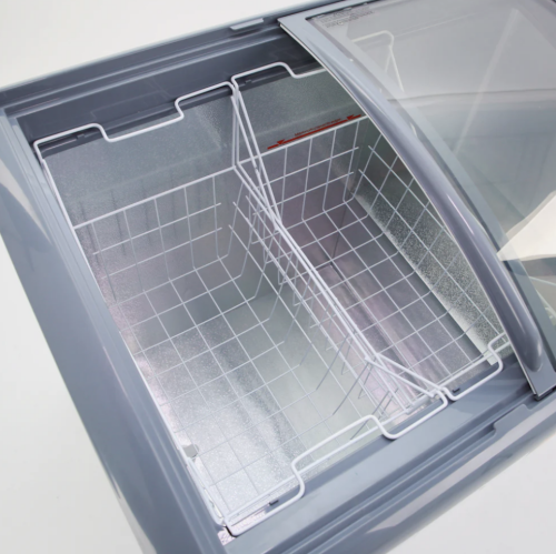 Top view of open commercial glass top freezer with divided wire baskets in Refrigerators and Appliances collections