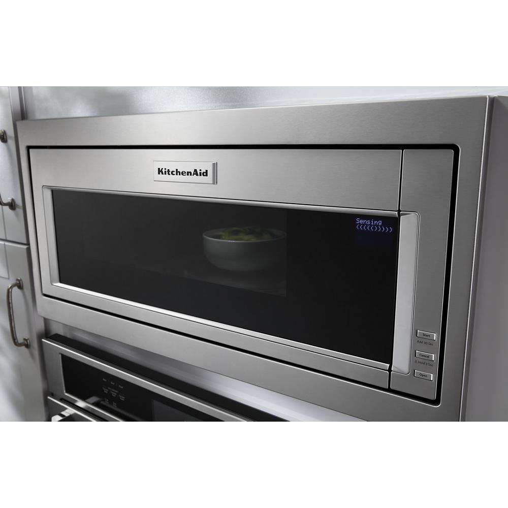 Built-in low profile stainless steel microwave with digital controls, part of KitchenAid appliances and home improvement collection