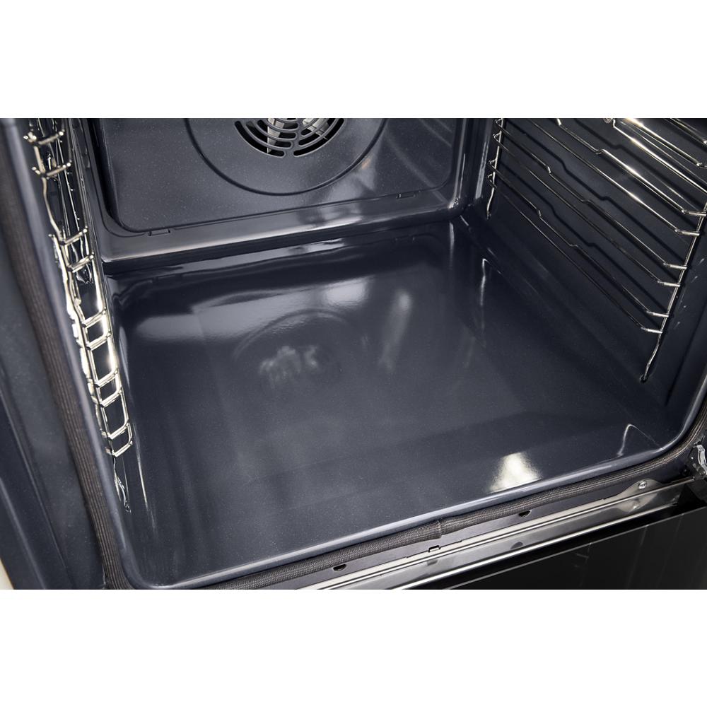 Interior view of a clean convection wall oven cavity with racks and rear fan from Wall Ovens collection