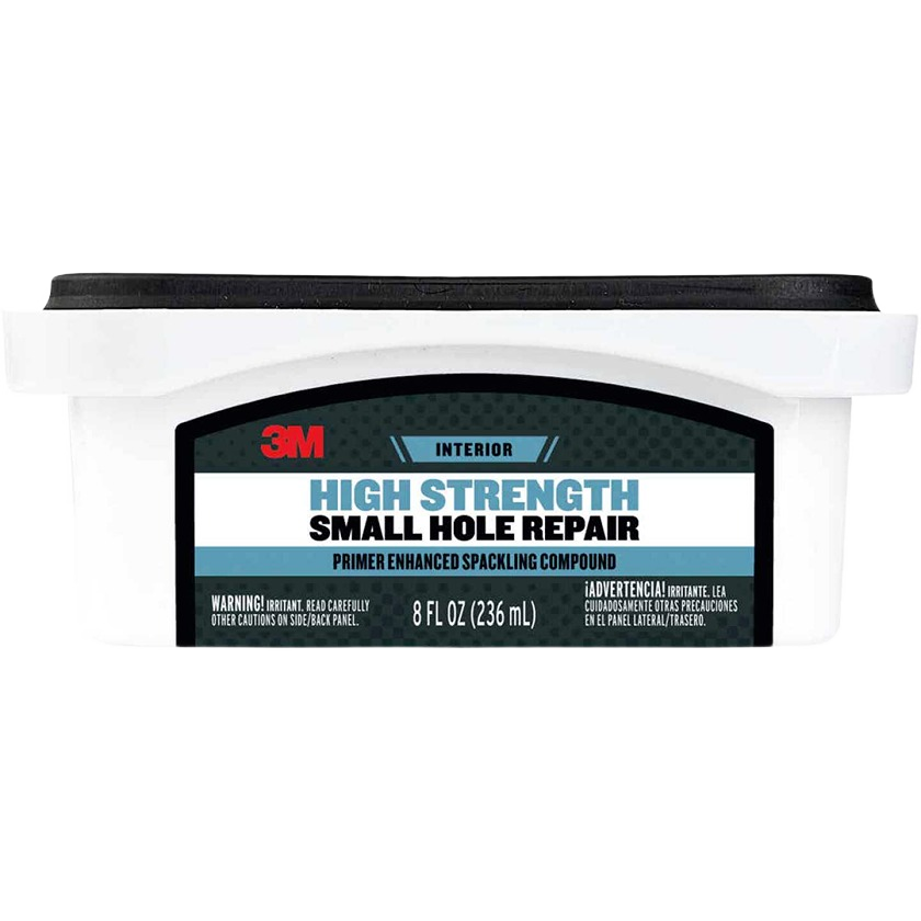8 oz container of high strength spackling compound with primer for small hole repair in home improvement collections