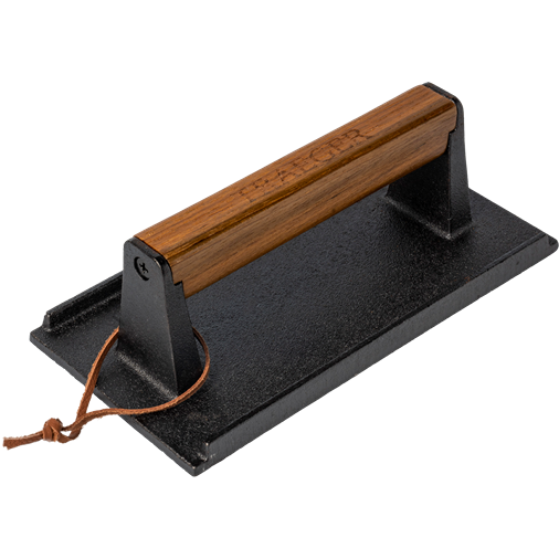 Cast iron burger press with wooden grip and leather loop for grilling and outdoor cooking accessories collection