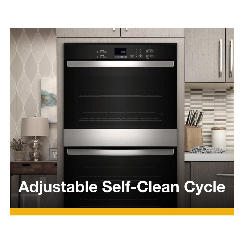 Built-in stainless steel double wall oven with digital display and adjustable self-clean feature in modern kitchen setting