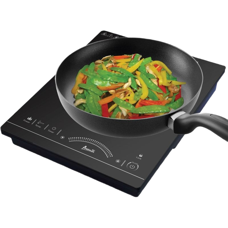 Black avanti portable induction cooktop with digital touch controls cooking colorful stir-fry vegetables