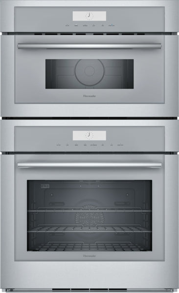 Stainless steel combination wall oven with digital controls and glass doors in Thermador kitchen appliances and home improvement