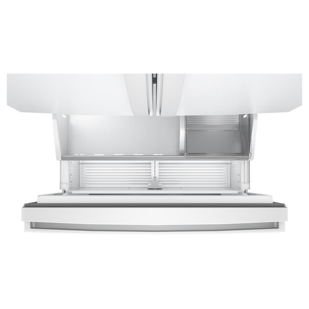 Open bottom freezer drawer with organized storage compartments in a white French door refrigerator for kitchen appliances and home improvement.