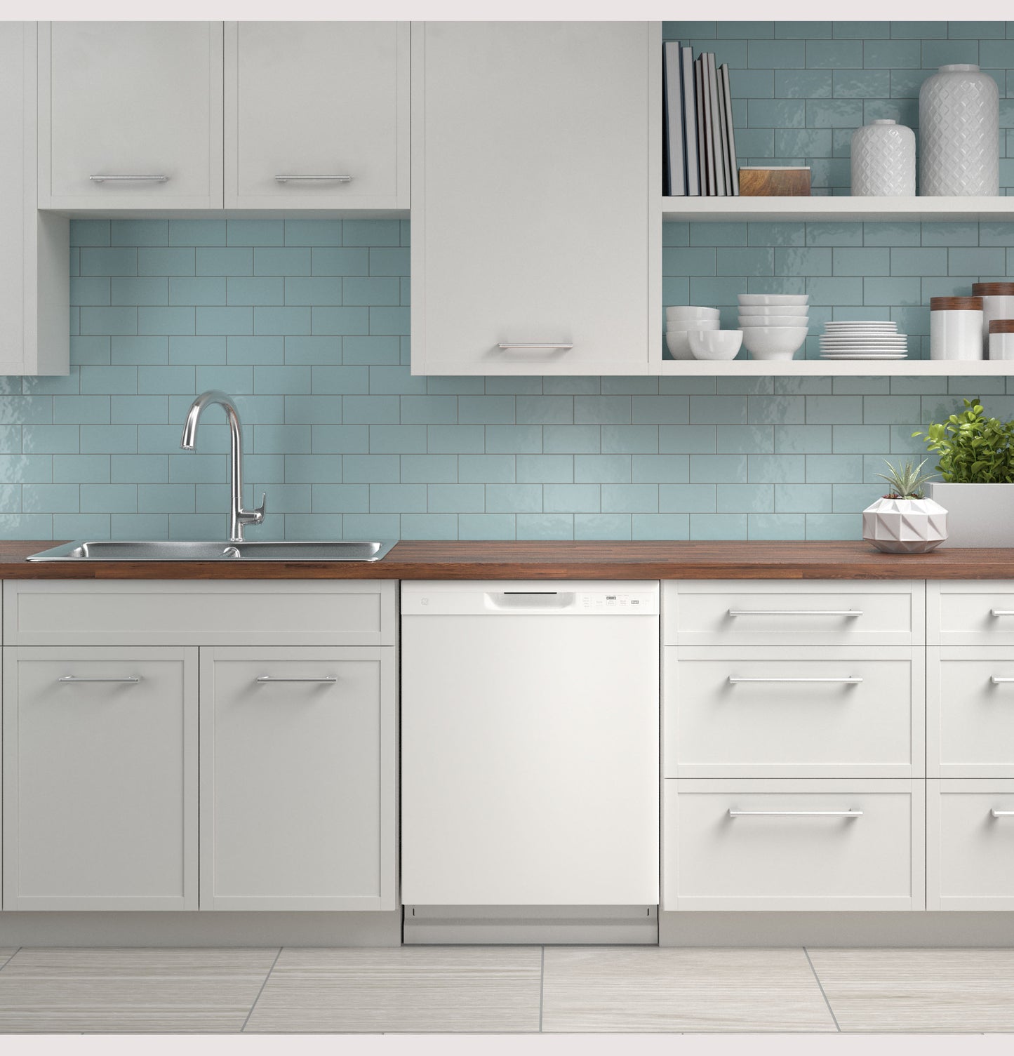 White dishwasher with front controls integrated into modern kitchen cabinetry with blue tiled backsplash and wood countertop
