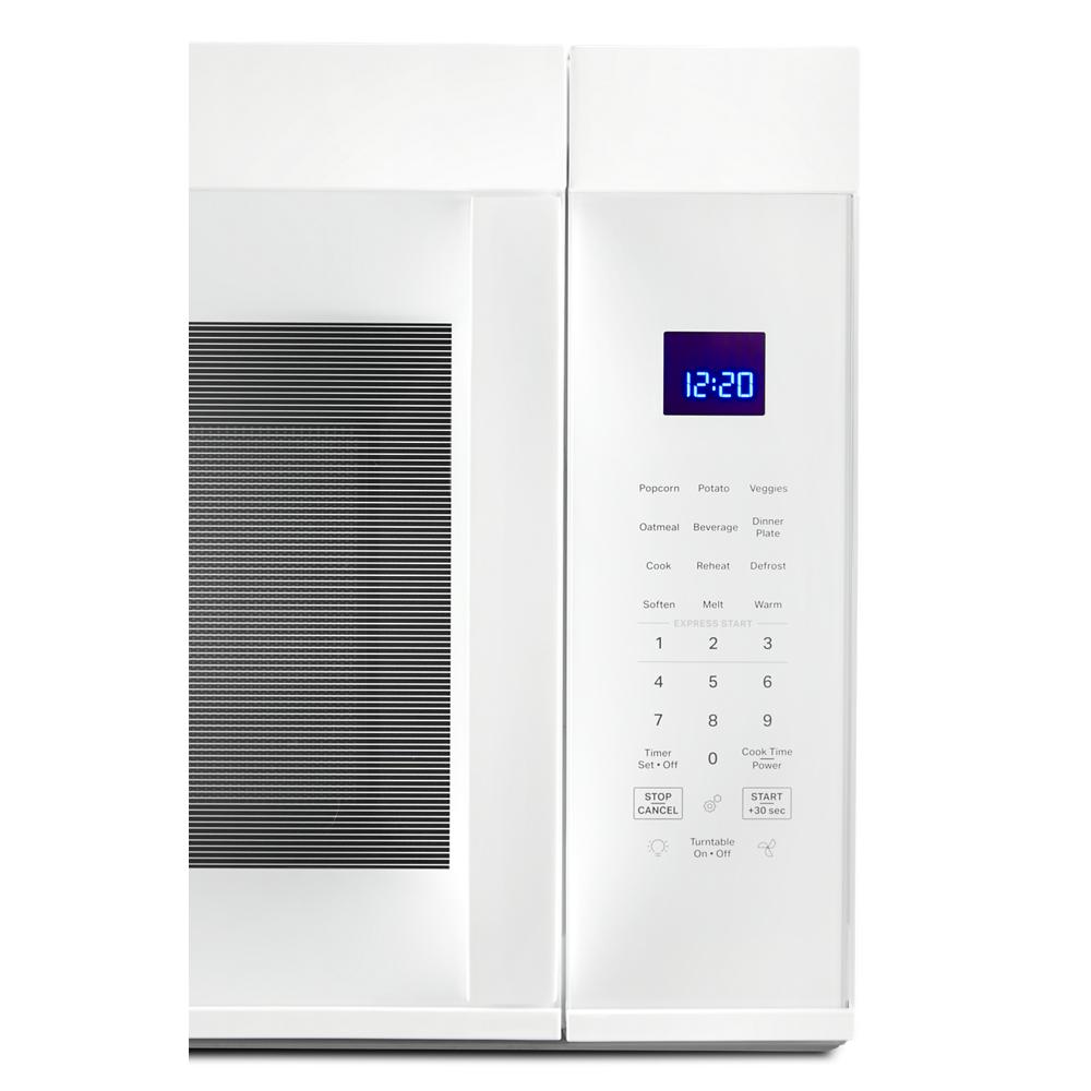 White over-the-range microwave with digital blue display and sensor cooking controls in kitchen appliances collection