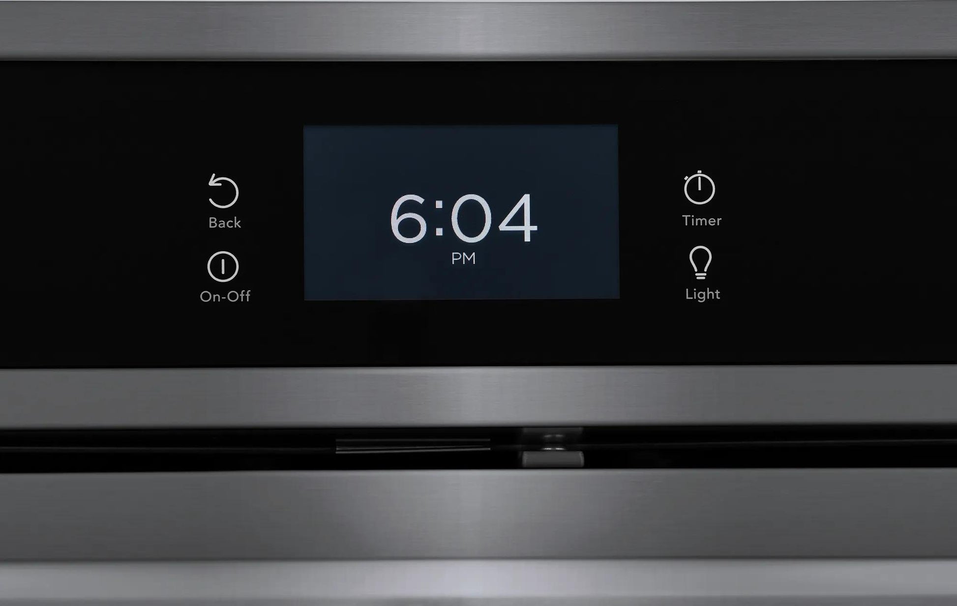 Close-up of digital control panel on stainless double wall oven showing time and function icons for timer and light
