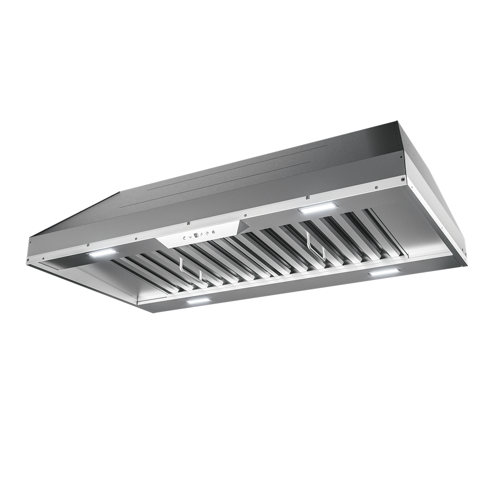 Low-angle view of stainless steel range hood insert with LED lighting and baffle filters in kitchen appliances collection