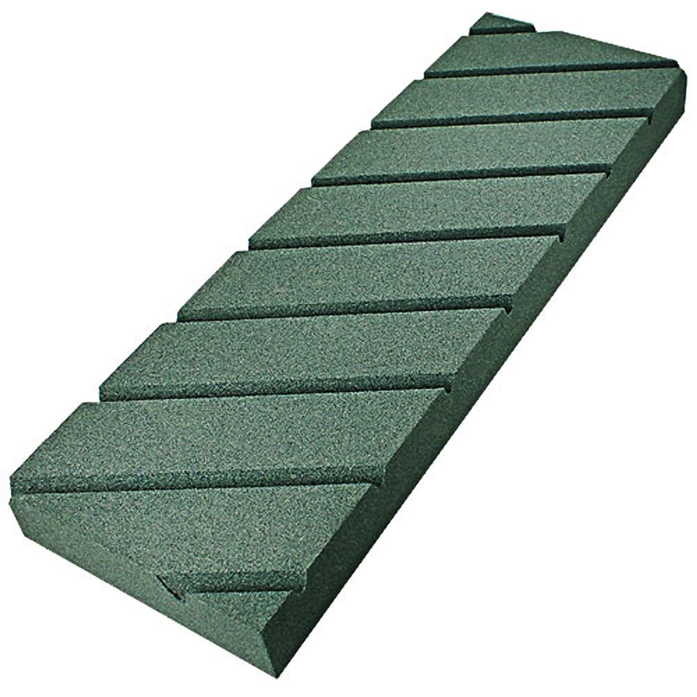 Green sharpening stone with grooved surface designed for flattening and tool maintenance in home improvement tasks