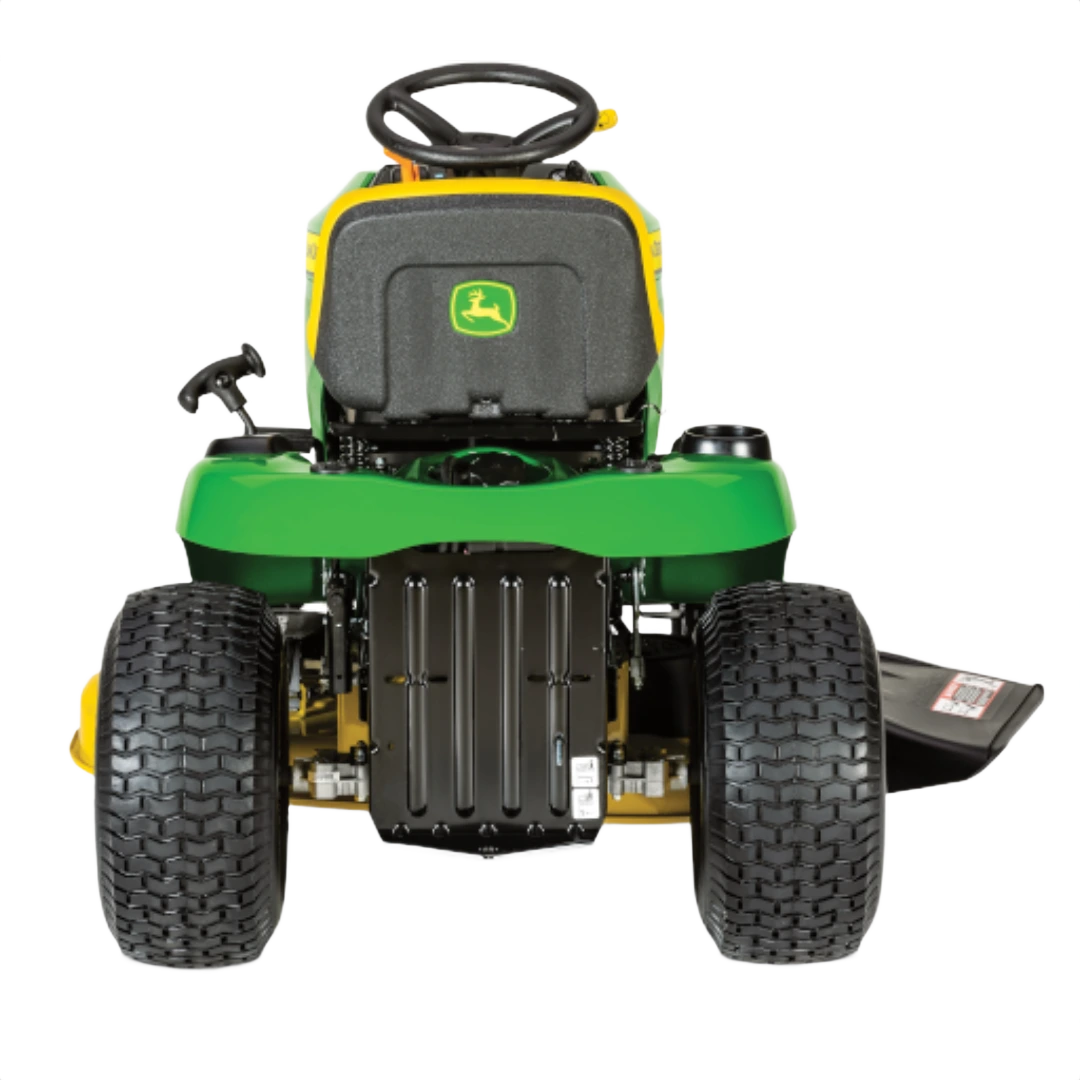 Rear view of green and yellow John Deere lawn tractor showing wide tires and compact mower deck for home lawn care tasks