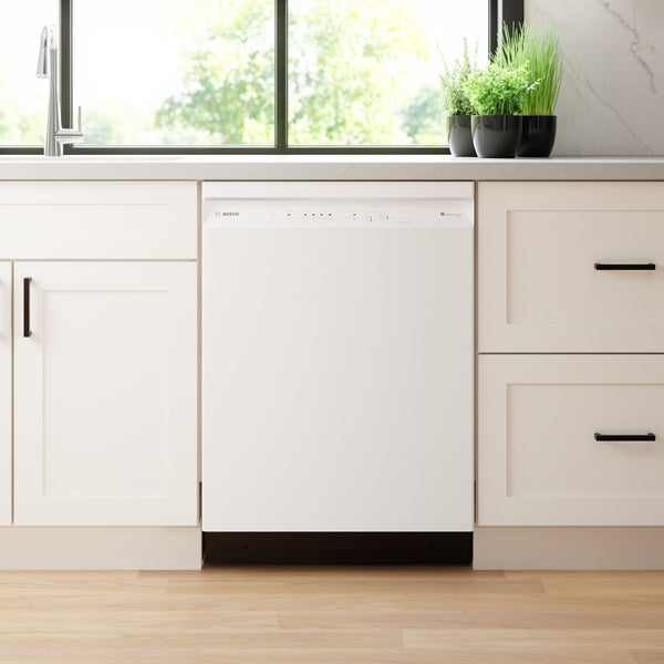 White built-in dishwasher integrated into a bright kitchen with white cabinetry and black hardware from Bosch appliances collection