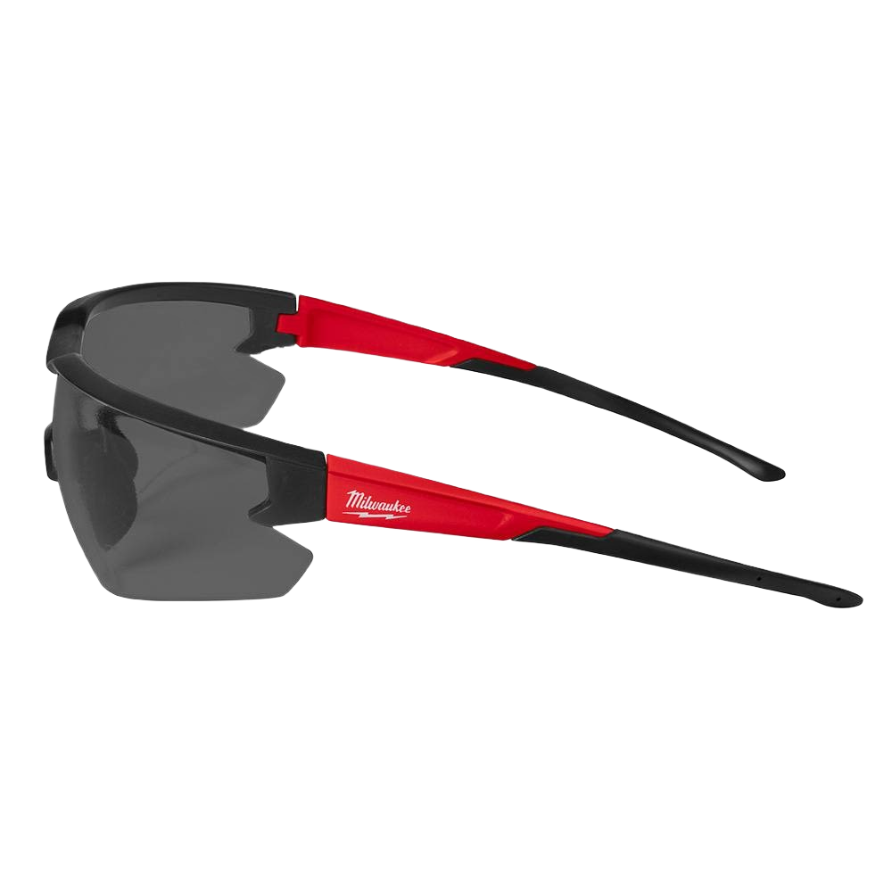 Milwaukee safety glasses with tinted fog-free lenses and red-black frame for protective eyewear in home improvement tasks