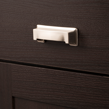 Satin nickel cup pull with sleek modern design installed on dark wood cabinet for furniture hardware and home improvement