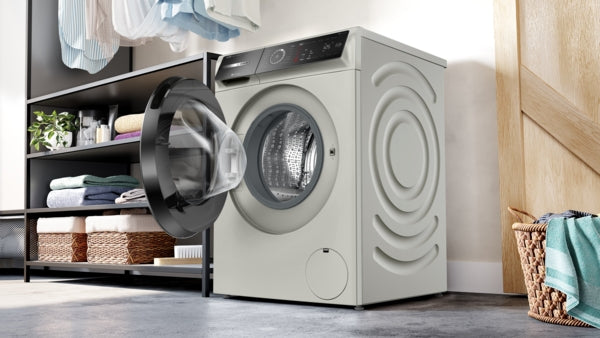 Open front load washer in pearl steel with modern design, part of Bosch washers and home appliances collection