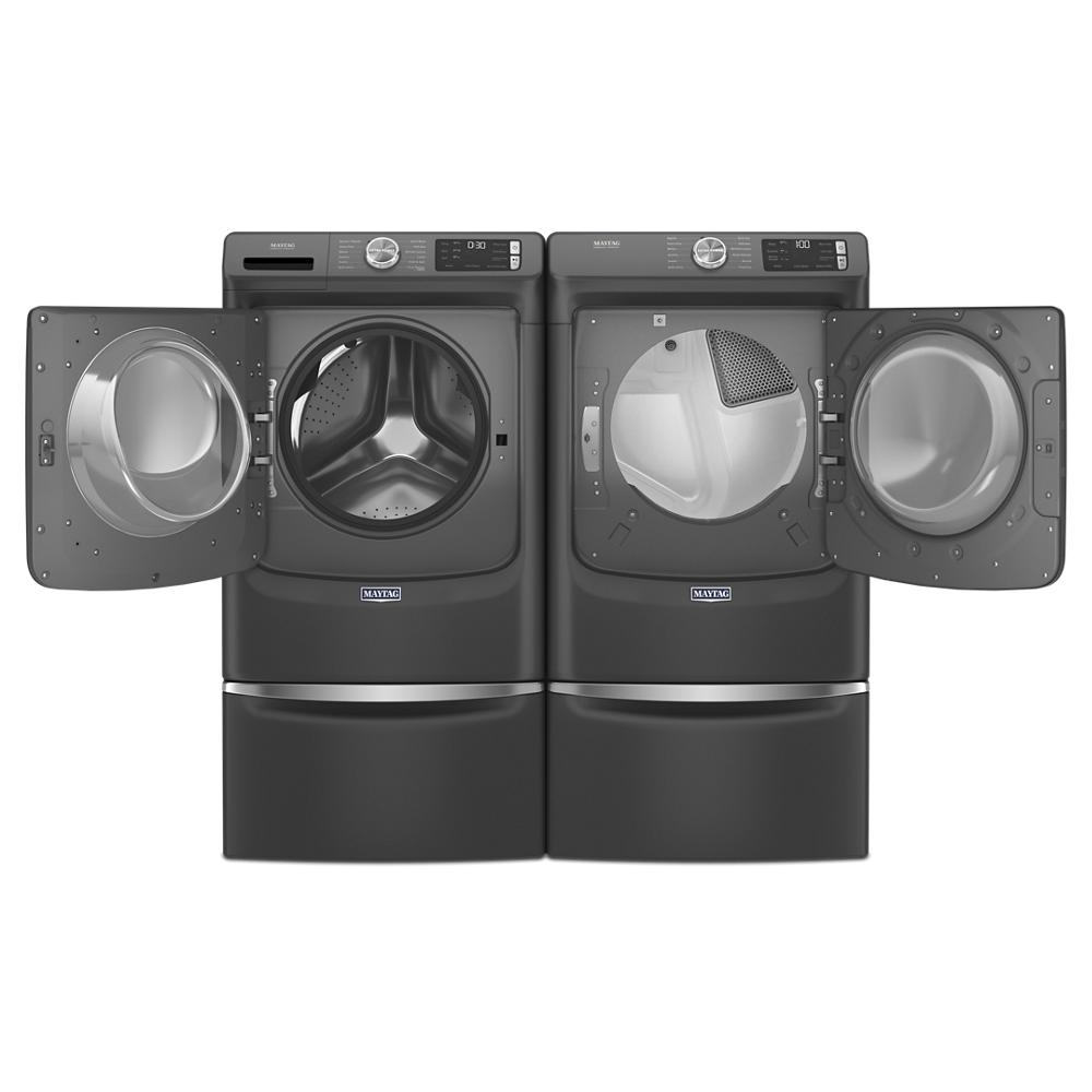 Black front load washer and matching dryer with open doors, digital controls, and pedestal bases for washers and appliances collection