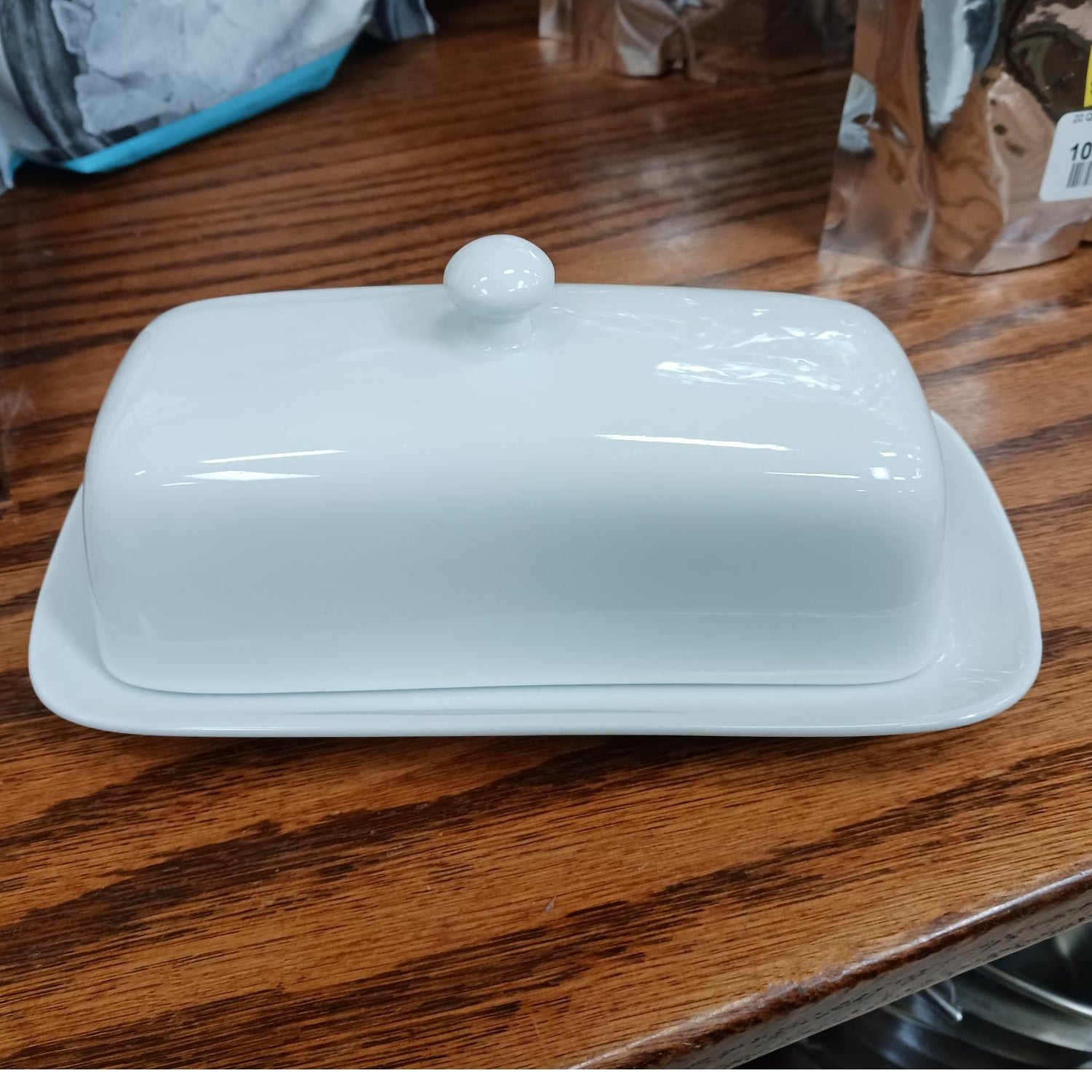 White ceramic butter dish with knob lid for kitchen storage and food organization under $50 collection