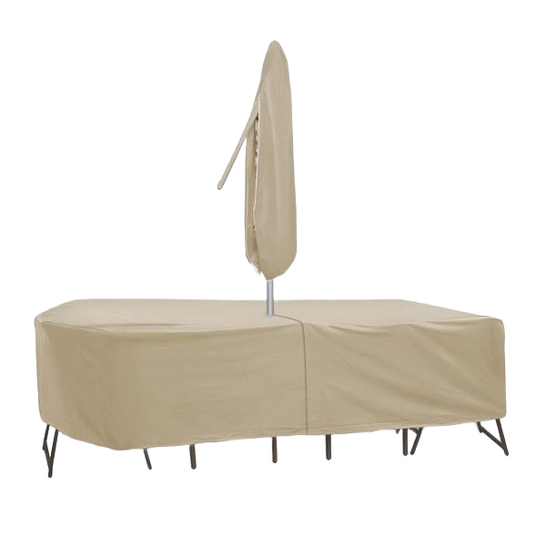Beige heavy-duty vinyl cover protecting oval and rectangular patio table with chairs and closed umbrella from outdoor elements