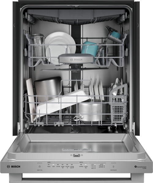 Open stainless steel dishwasher with loaded racks including plates, glasses, cookware, and cutlery from Bosch Appliances collection