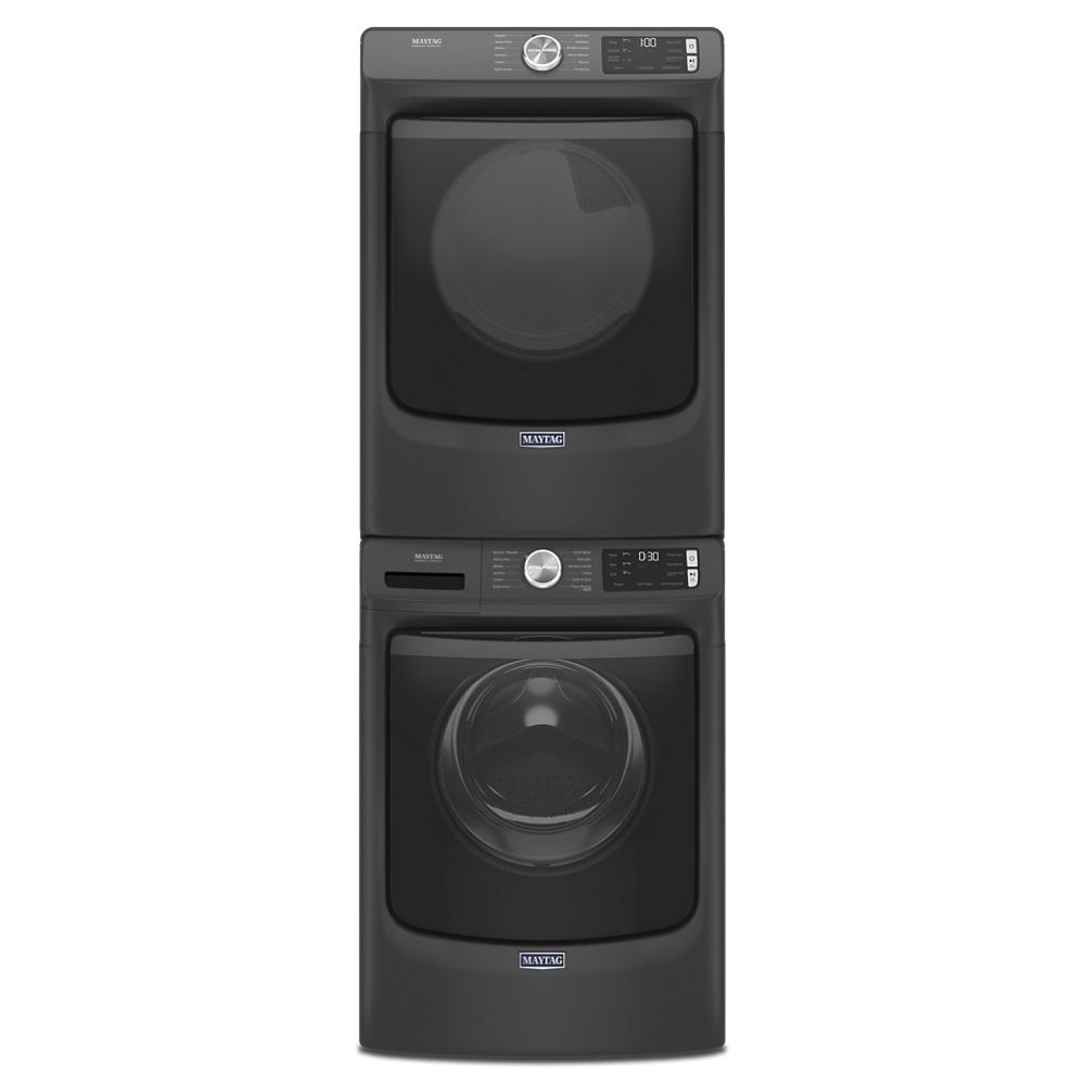 Stacked black front load electric dryer and washer combo with digital controls and modern sleek design