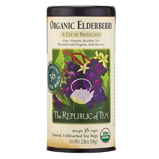 Cylindrical tin of organic elderberry red tea with 36 unbleached tea bags and natural ingredients label