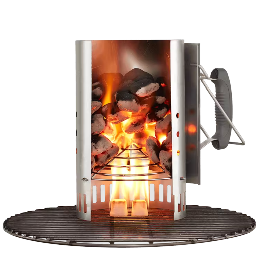 Steel chimney charcoal starter with heat-resistant handle igniting briquettes for grilling in outdoor living and grill accessories collections