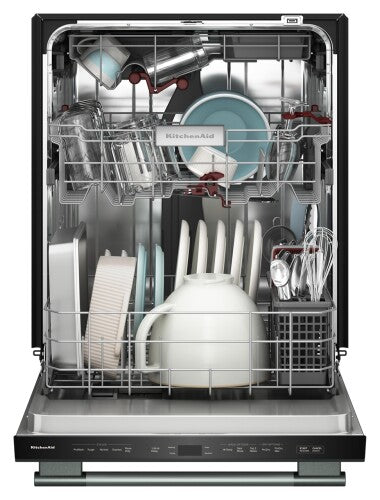 Open KitchenAid dishwasher loaded with plates, cups, and silverware in stainless steel interior for home kitchens