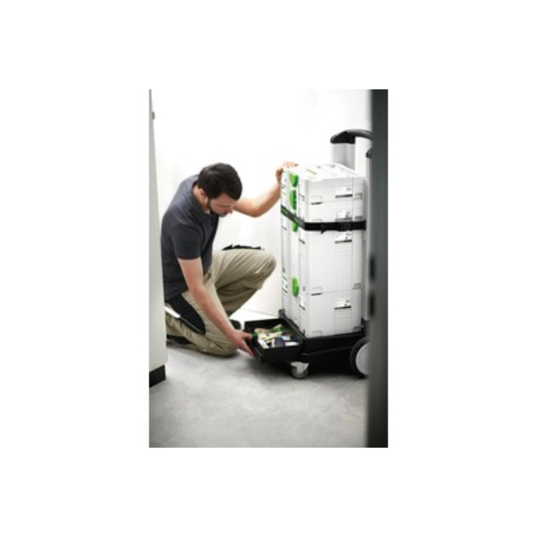 Person kneeling next to storage dolly with pull-out tray holding organized tools for workshop and jobsite use