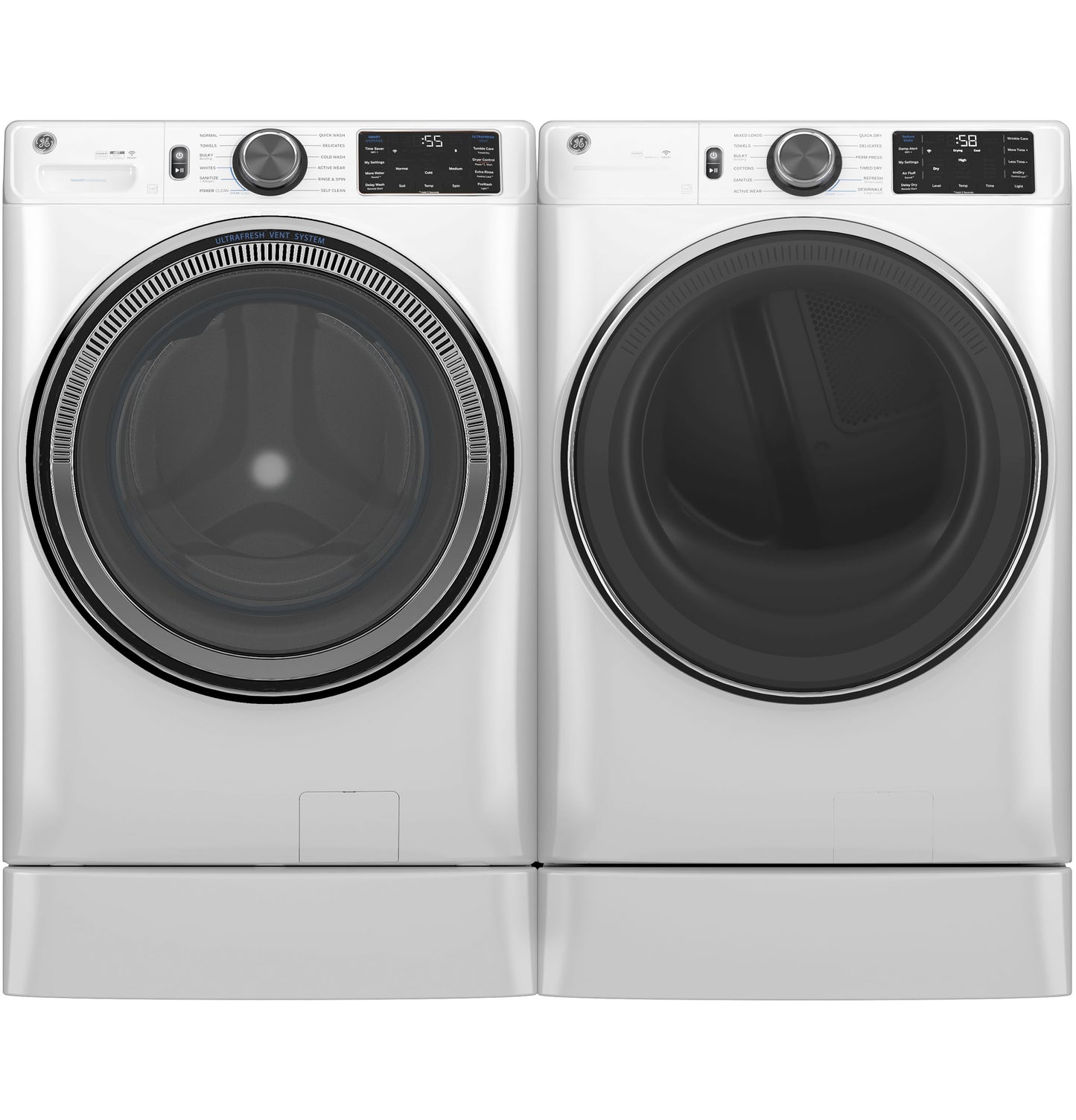 Front load white washer and dryer pair with digital controls, sleek doors, and pedestal bases in washers and dryers collection