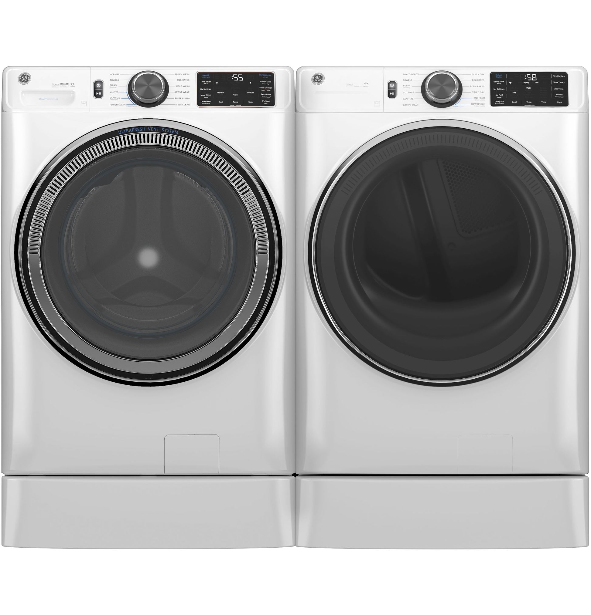 Front load white washer and dryer pair with digital controls, sleek doors, and pedestal bases in washers and dryers collection