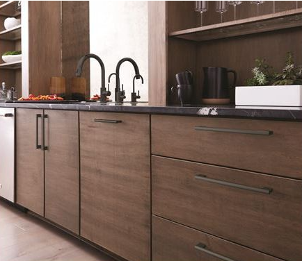 Matte black 6-5/16 inch cabinet pulls on wood cabinetry in modern kitchen hardware and furniture accessories collection