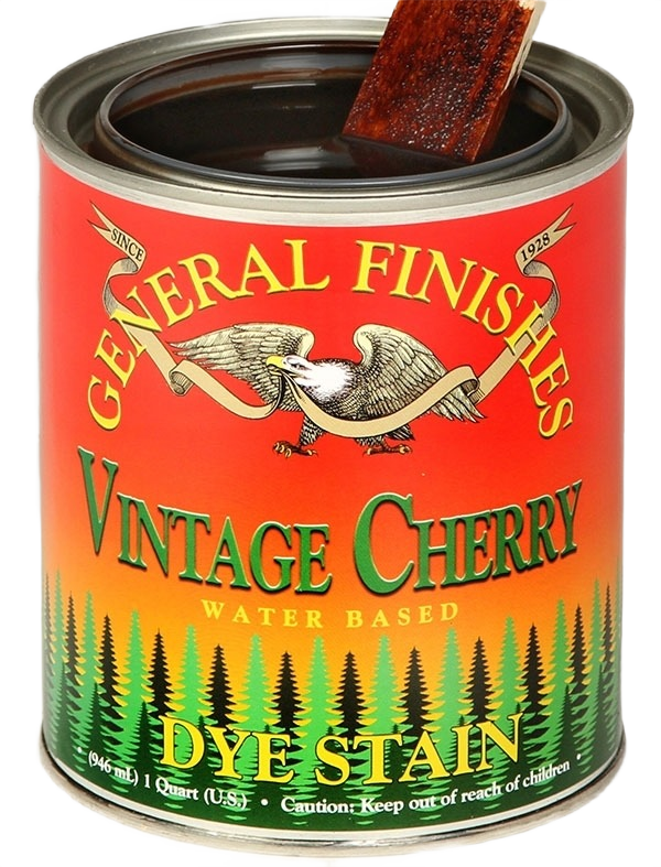 Open can of vintage cherry water based dye stain with wood piece dipped in stain from Paint & Supplies under $50 collection