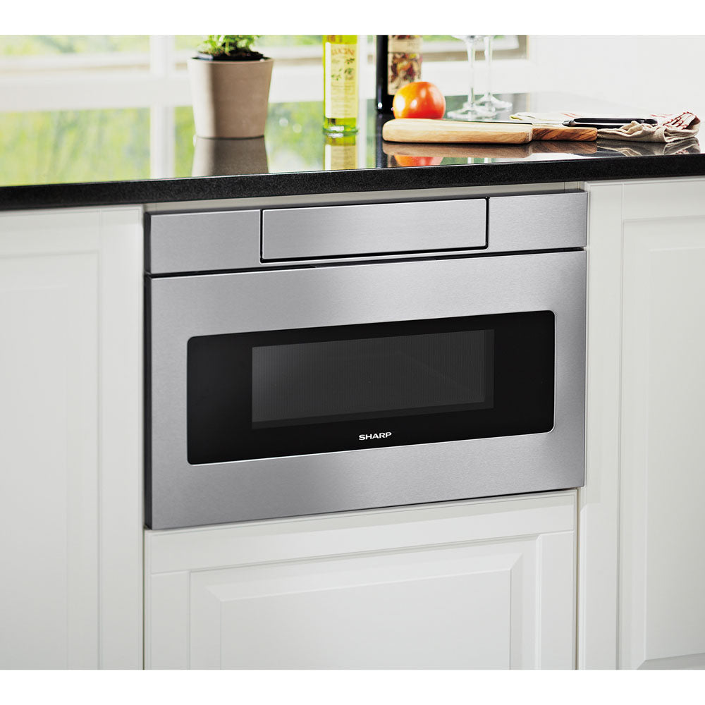 Stainless steel built-in microwave drawer with flat panel and easy touch open in modern kitchen setting