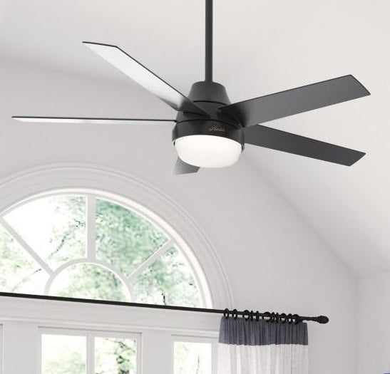 Matte black ceiling fan with five blades and integrated LED light, designed for modern indoor ceiling lighting and home decor.