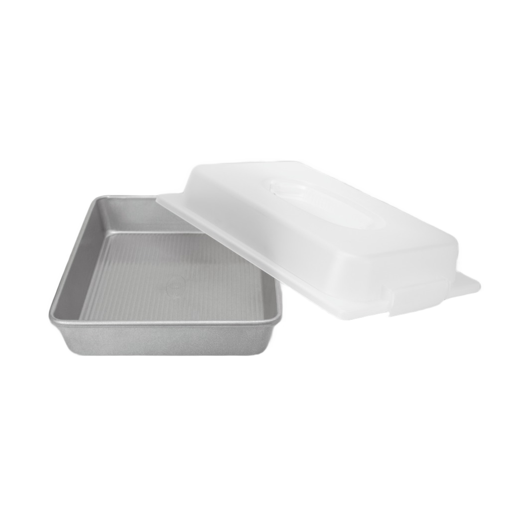 Rectangular non-stick metal cake pan with clear plastic lid for bakeware and kitchen gadgets under $50 collection