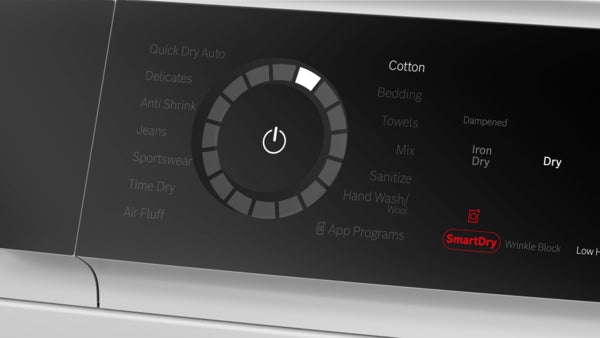 Close-up of control panel on Bosch 500 Series heat pump dryer showing cycle selector and digital display modes