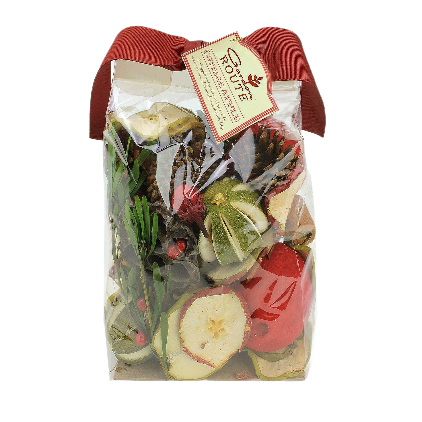 Clear bag of botanical potpourri with dried apple slices, pinecones, greenery, and red ribbon bow