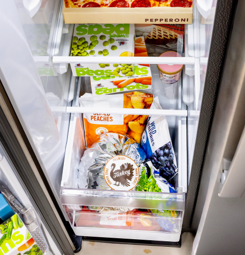 GE® 24.2 Cu. Ft. Counter-Depth Side-By-Side Refrigerator with Internal Dispenser and In-Door Icemaker