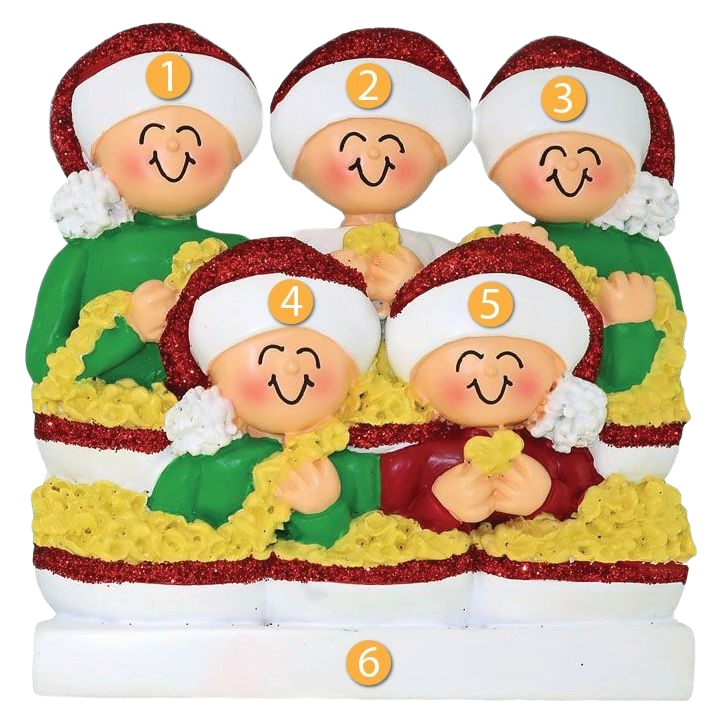 Festive family of five wearing red and white hats stringing popcorn garland in Christmas decorations under $50 collection