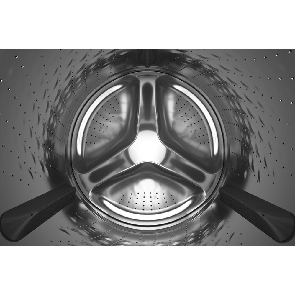 Interior view of stainless steel drum in front load washer from washers and appliances collections