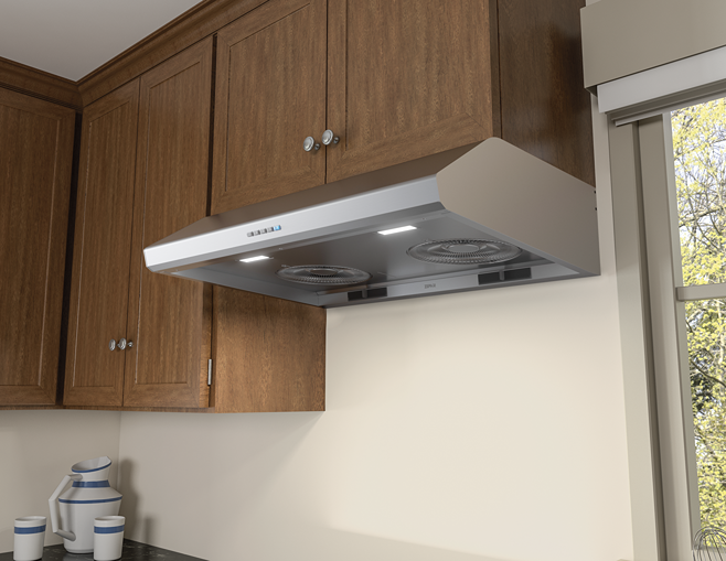 Under cabinet range hood with LED lights and touch controls installed beneath wood kitchen cabinets in home setting