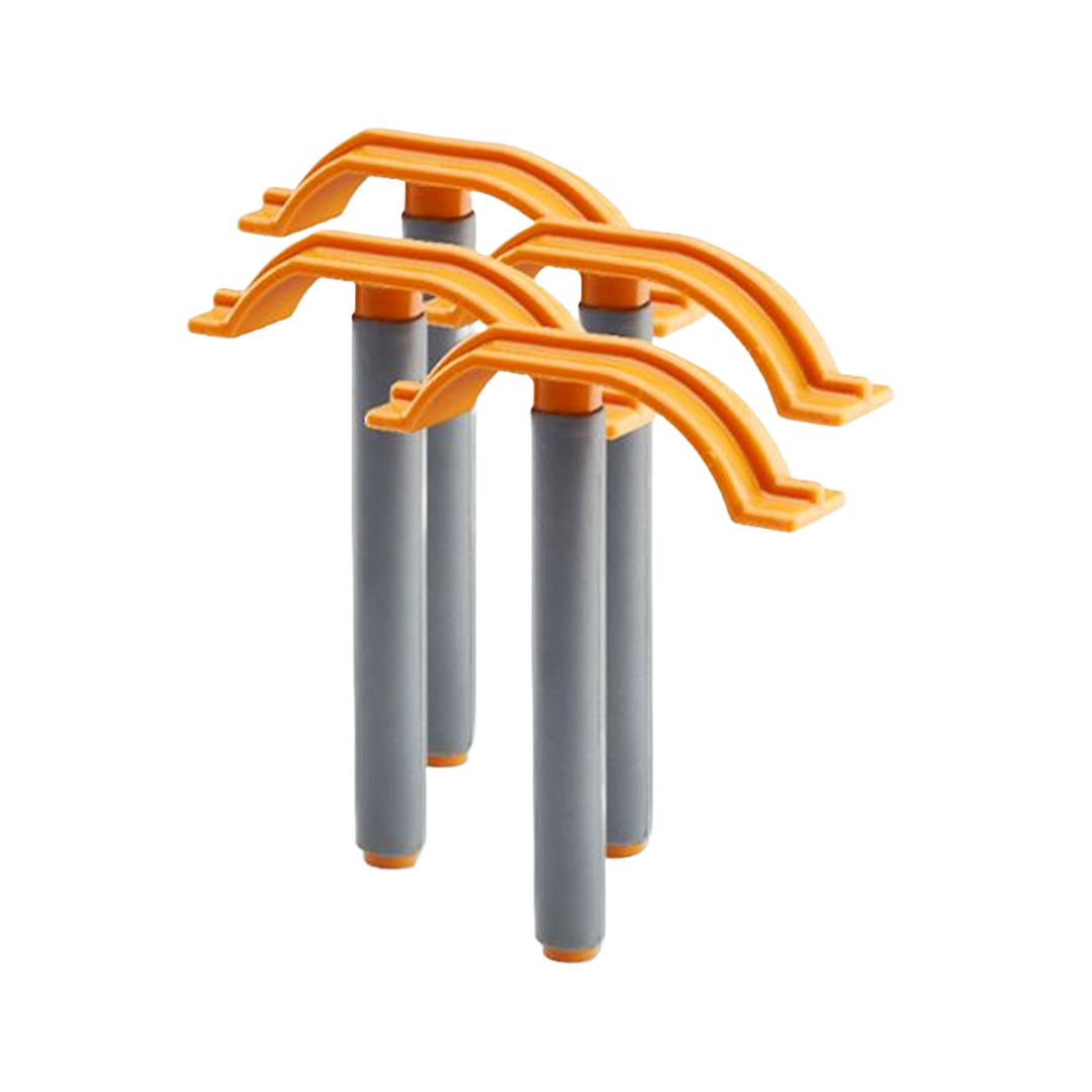 Set of four quick clamps with orange handles and gray bars designed for efficient woodworking and home improvement tasks
