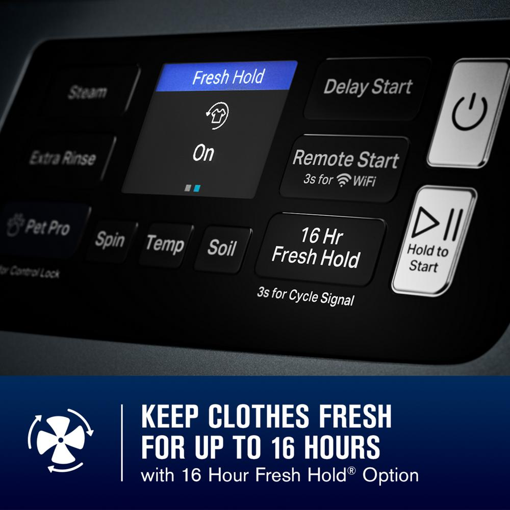 Close-up of washer control panel showing fresh hold, remote start, and cycle start buttons on dark surface