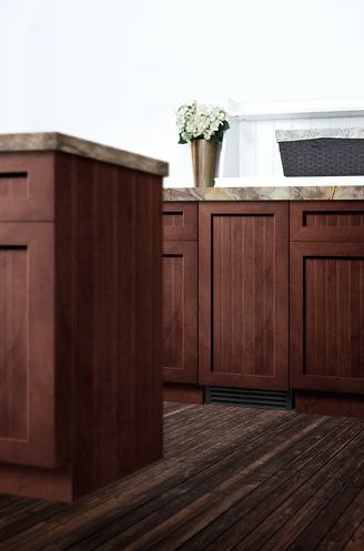 Modern kitchen with rich wood cabinetry, marble countertops, and decorative accents in Appliances and Kitchenware collection