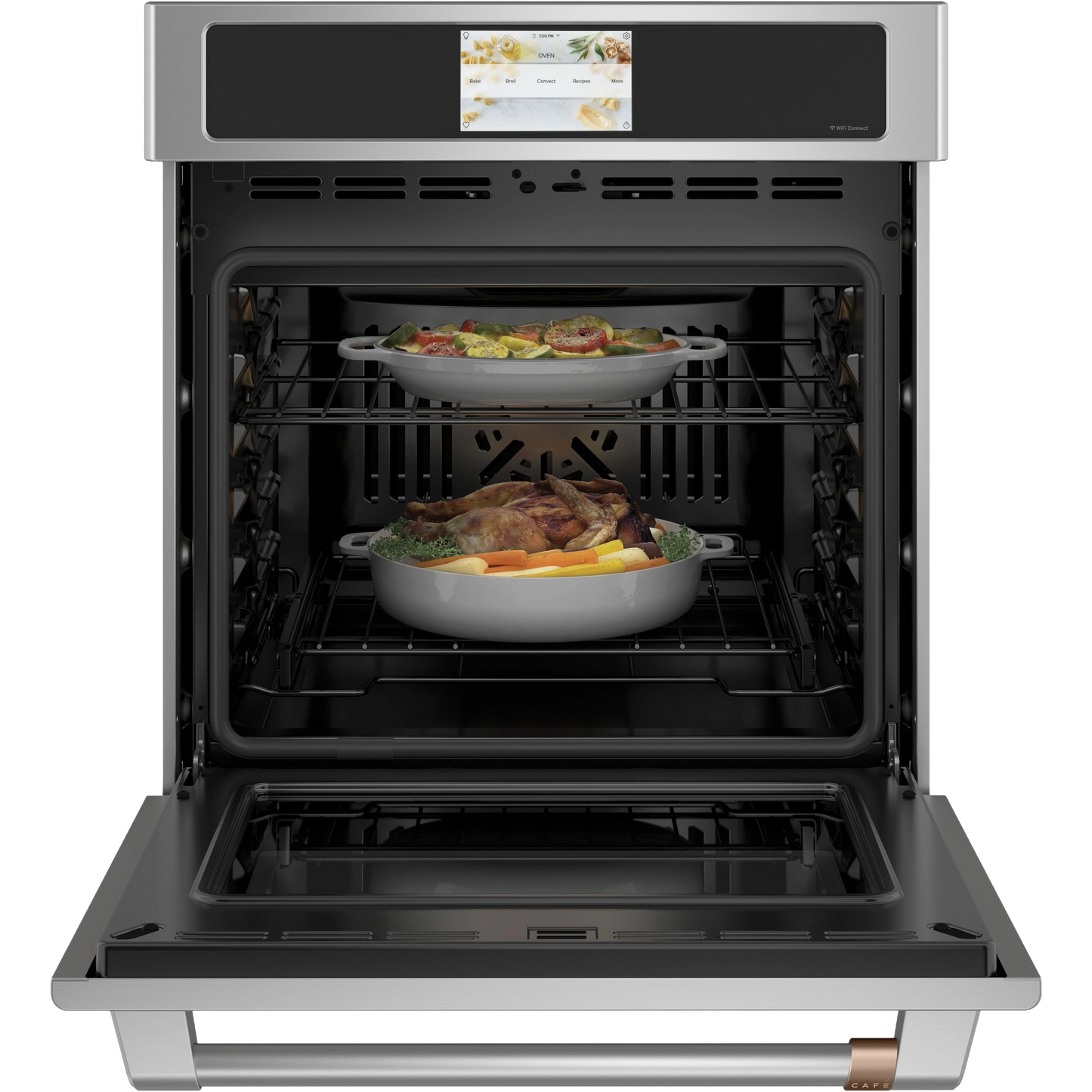 Open stainless steel wall oven with two dishes cooking on racks, part of kitchen appliances and wall ovens collection