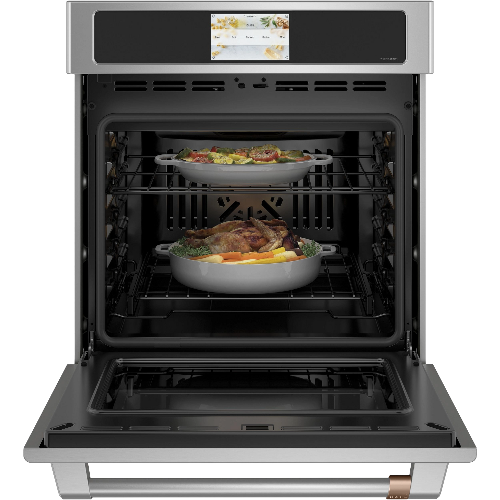 Open stainless steel wall oven with two dishes cooking on racks, part of kitchen appliances and wall ovens collection