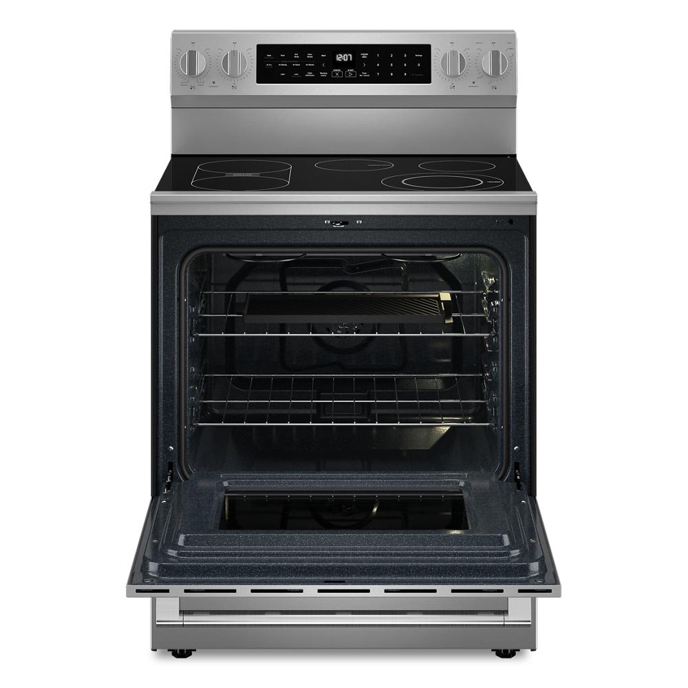 Front view of stainless steel 30-inch electric range with open oven door and digital control panel in ranges collection
